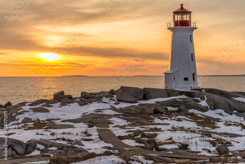Peggy's Cove Lighthouse with a winter sunset