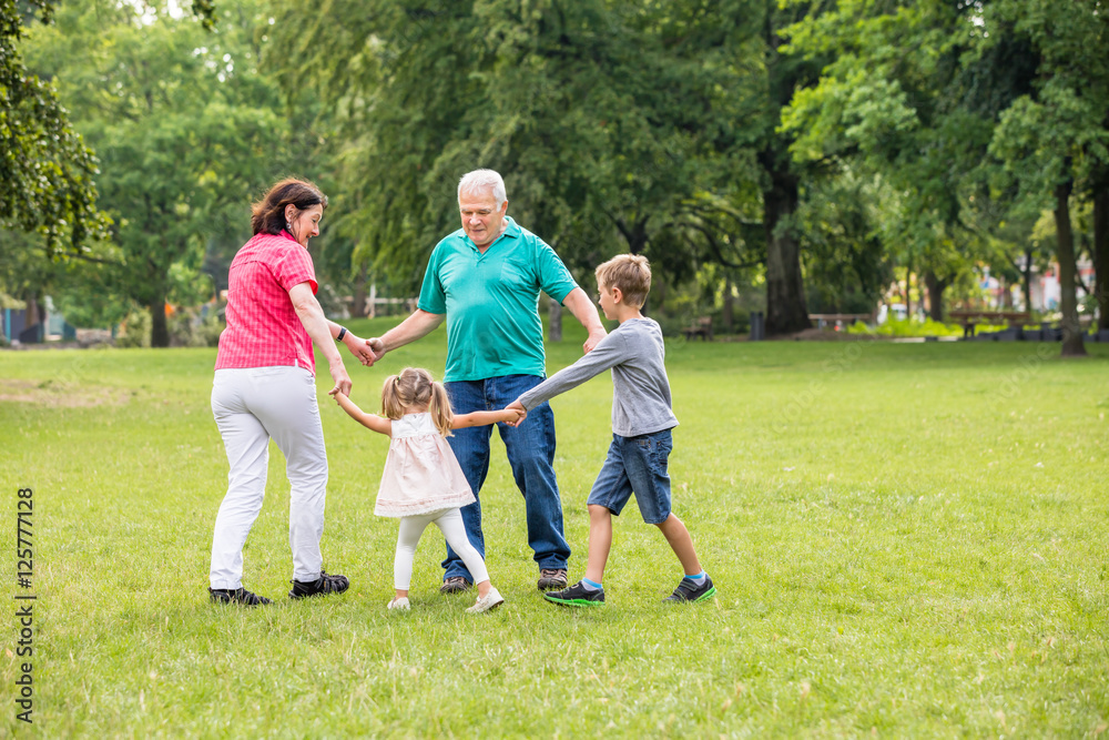 Grandparents Playing With Their Grandchildren Grandparents Playing With Their Grandchildren