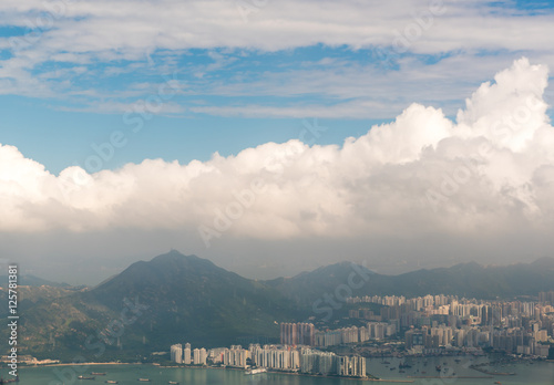 View from airplane window above the cloud over Hong Kong island international airport
