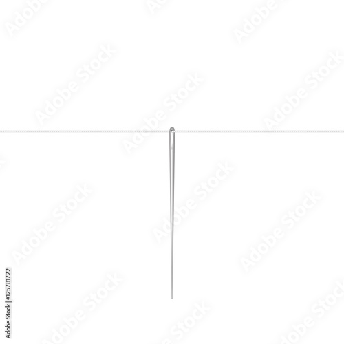 Needle in silver design hanging on white thread