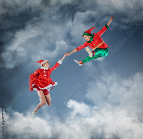 Funny kids in Peter pan and snow maiden costume. photo