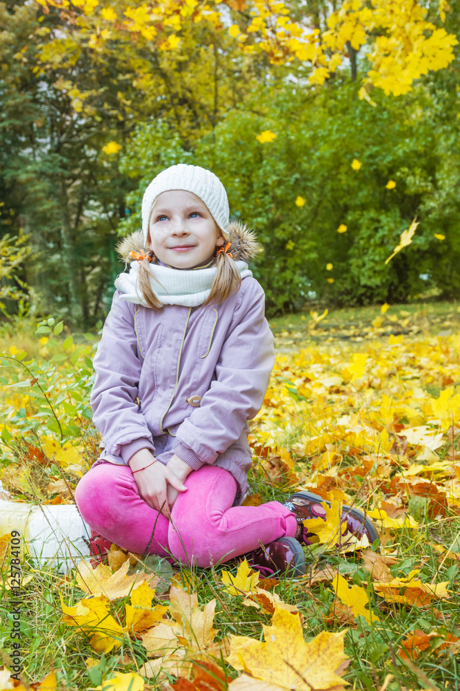 Girl under falling yellow leaves Girl under falling yellow leaves