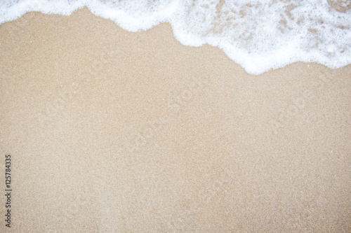 Small wave at the beach background. photo