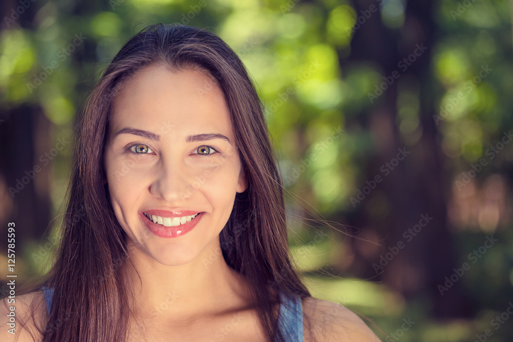 Portrait of a pretty happy woman, smiling Portrait of a pretty happy woman, smiling