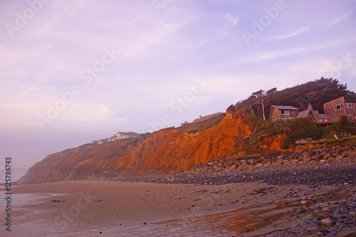 Homes on mudstone cliffs photo