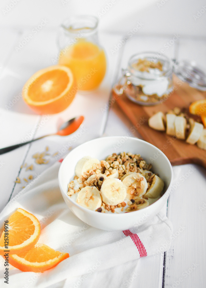 healthy breakfast bowl of yogurt with granola and banana healthy breakfast bowl of yogurt with granola and banana