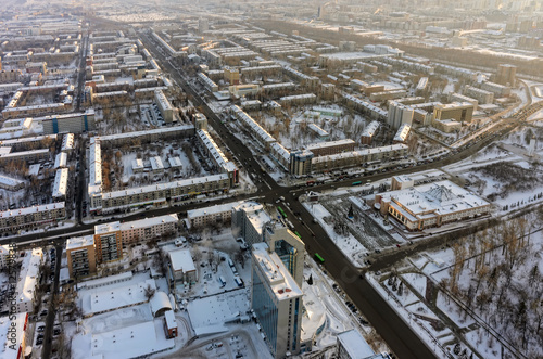 Tyumen, Russia - January 23, 2016: Aerial view on city quarters, office area and residential district Republic street © Aikon