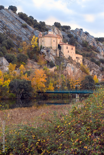 SORIA, SPAIN - NOVEMBER 2, 2016: View of the hermitage of San Saturio, on the banks of the Douro River at sunset photo