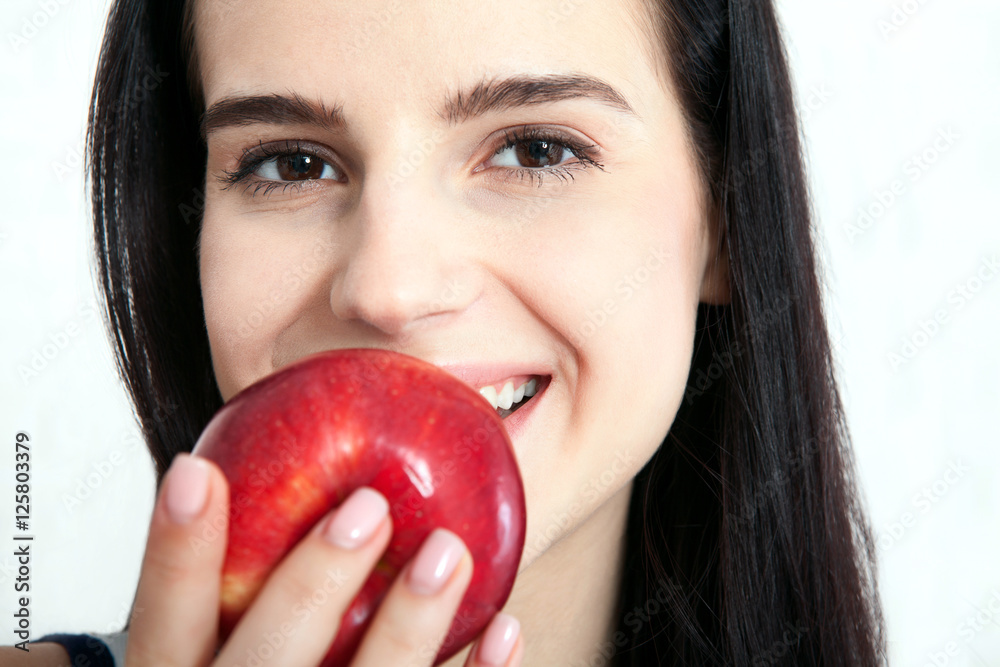 Woman with apple close-up face. Beautiful women exists to clean skin on the face. Concept of natural food. Asian woman. Woman with apple close-up face. Beautiful women exists to clean skin on the face. Concept of natural food. Asian woman.