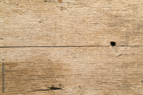 Wooden table with sunlight background