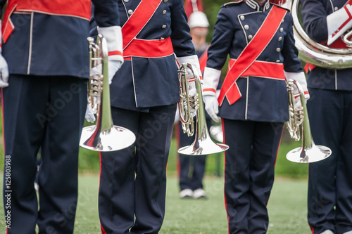 Show band with live music playing wind instruments in uniform, m