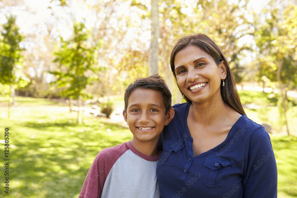 Mixed race Asian Caucasian mother and son in park, portrait Mixed race Asian Caucasian mother and son in park, portrait