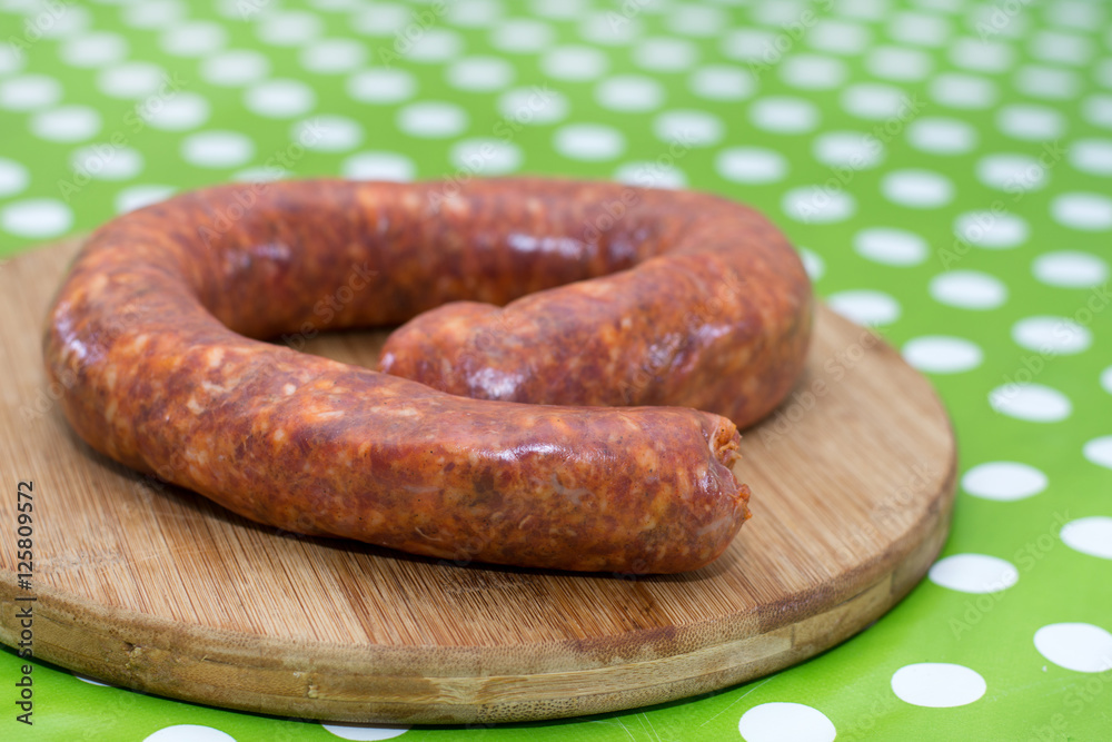 Domestic sausages on the cutting board