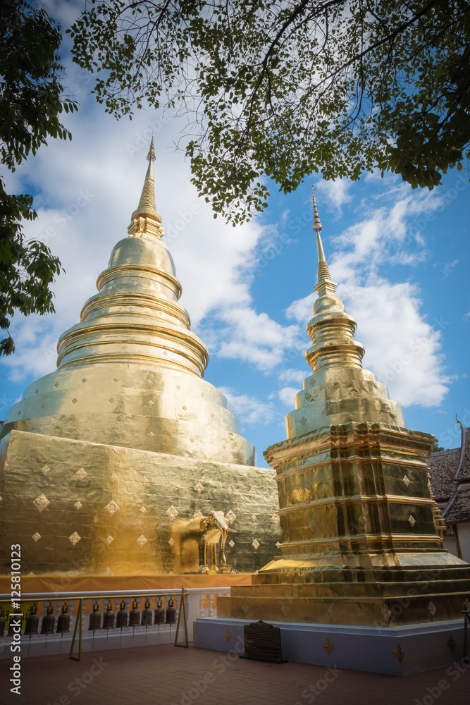 Fototapeta premium golden pagoda at a temple in Lamphun, Thailand