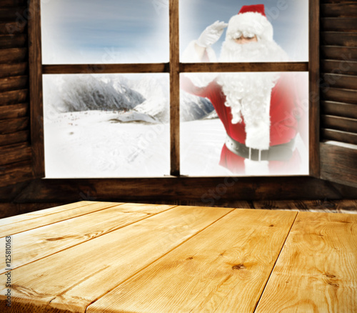 wooden desk space and santa claus 
