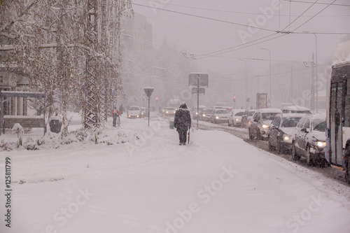 Winter background - snowstorm in city
