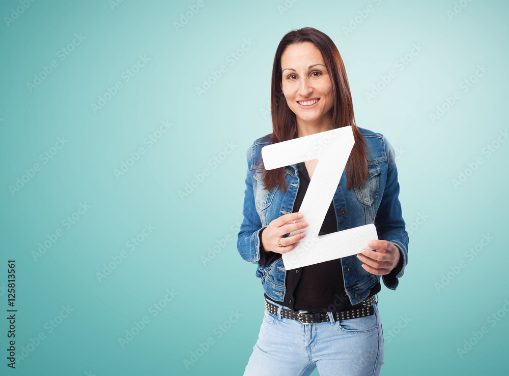 woman holding the Z letter woman holding the Z letter