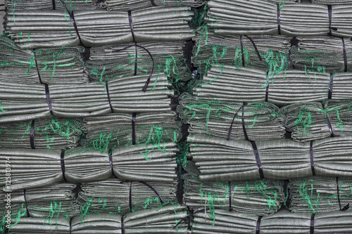 Stack of  folded plastic bag bundles, Binh Tay Market, Cholon District, Ho Chi Minh City, Vietnam photo