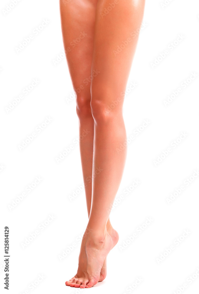Long woman legs on white background Long woman legs on white background