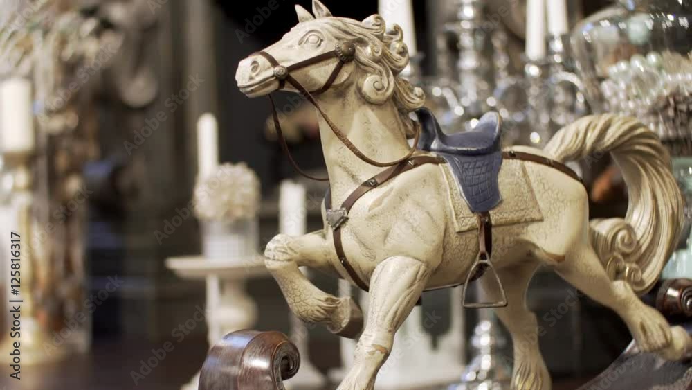 Wooden horse on a floor, a close up. Beautiful toy horse. The horse toy shakes on a floor, a close up. Close up Wooden horse on a floor, a close up. Beautiful toy horse. The horse toy shakes on a floor, a close up. Close up