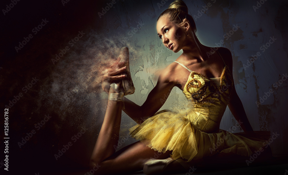 Lovely ballerina in yellow tutu. Image with a digital effects