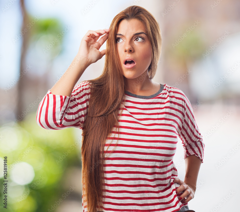 portrait of a worried young woman with a pensive gesture portrait of a worried young woman with a pensive gesture