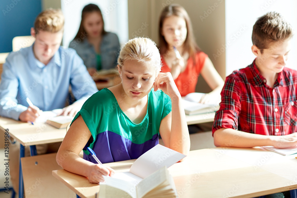group of students with books writing school test group of students with books writing school test