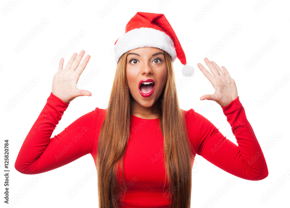portrait of a beautiful young woman with surprised gesture at Christmas portrait of a beautiful young woman with surprised gesture at Christmas