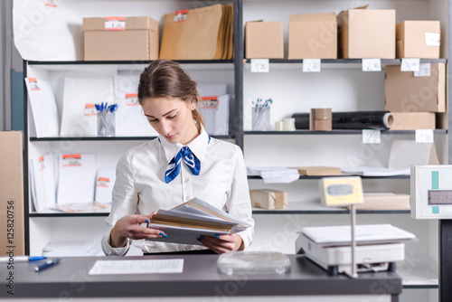 woman working at the post office