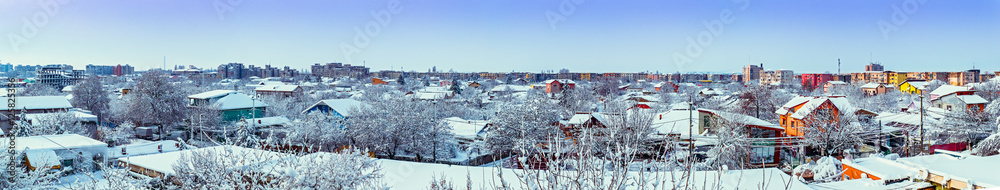 Winter panorama of town at sunset Winter panorama of town at sunset