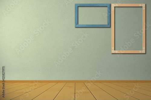 Blank photo frame at the wall with clipping path for the inside