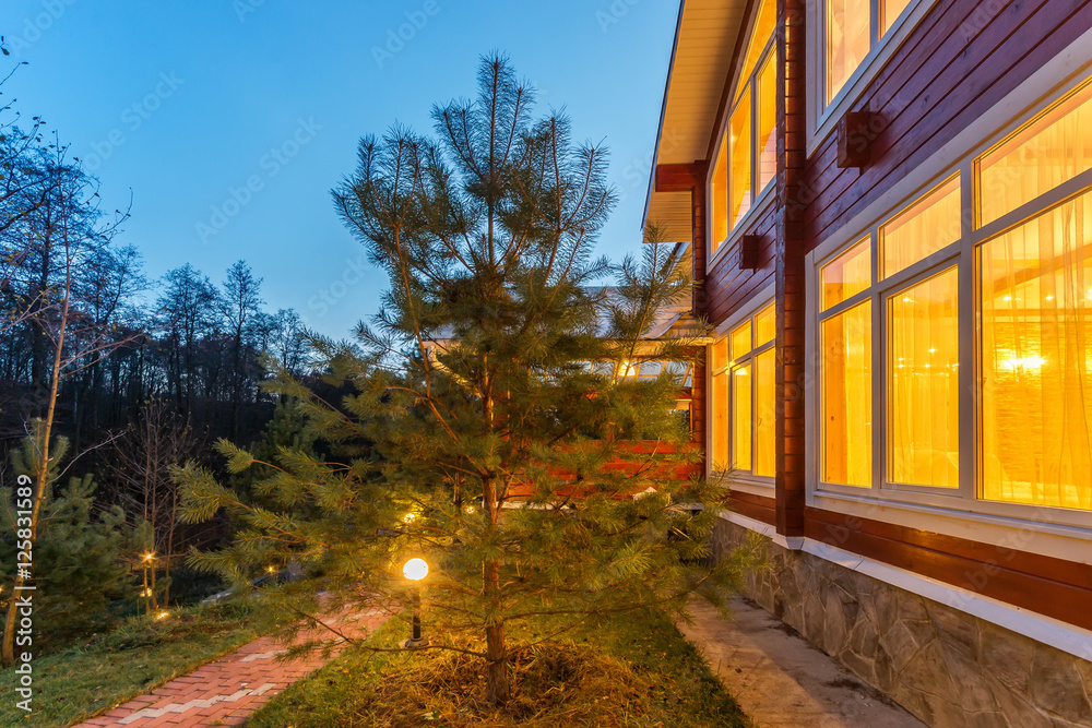 Fototapeta premium Log house and forest view