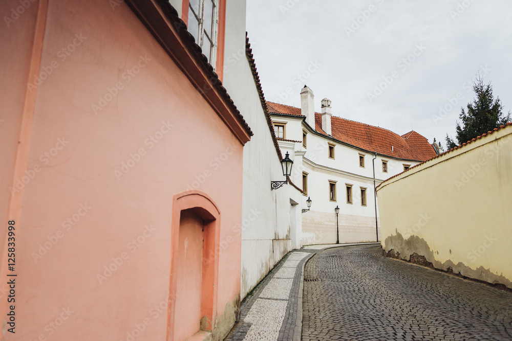 Prague cityscape in spring. Walking through old city center streets.