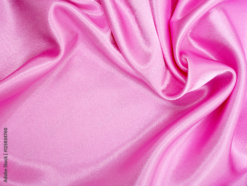 Fototapeta premium Smooth elegant pink silk as background