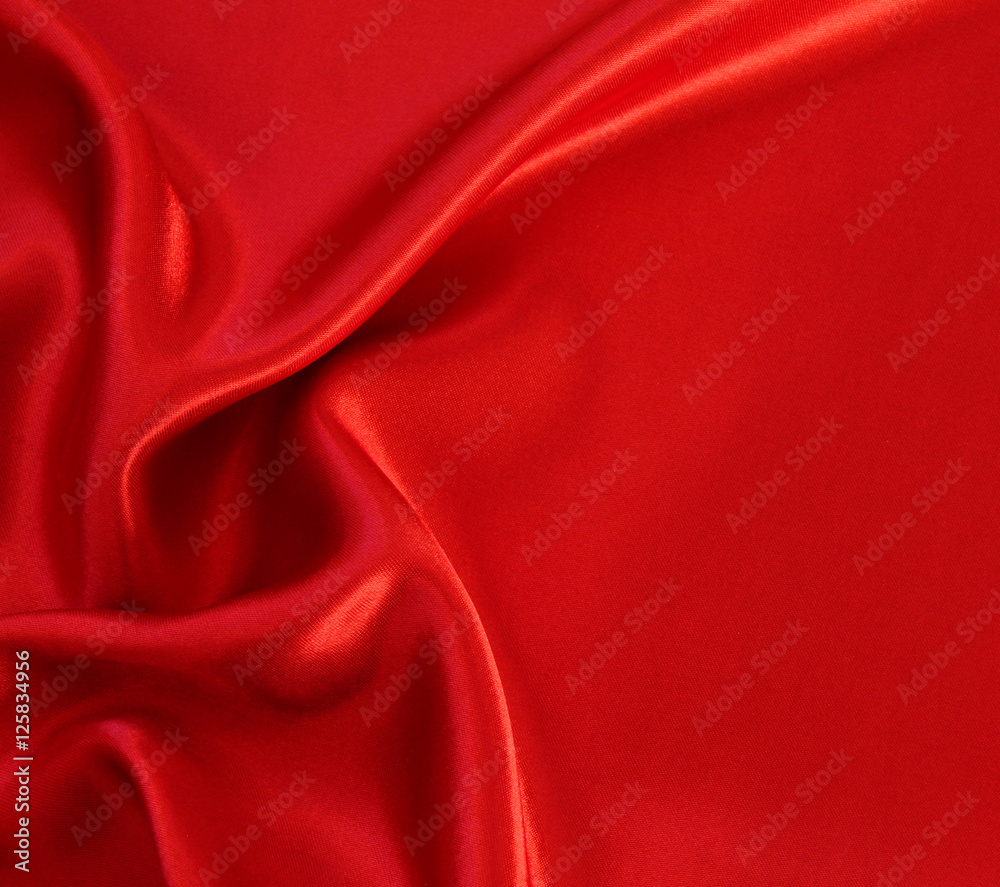 Obraz premium Smooth red silk as background