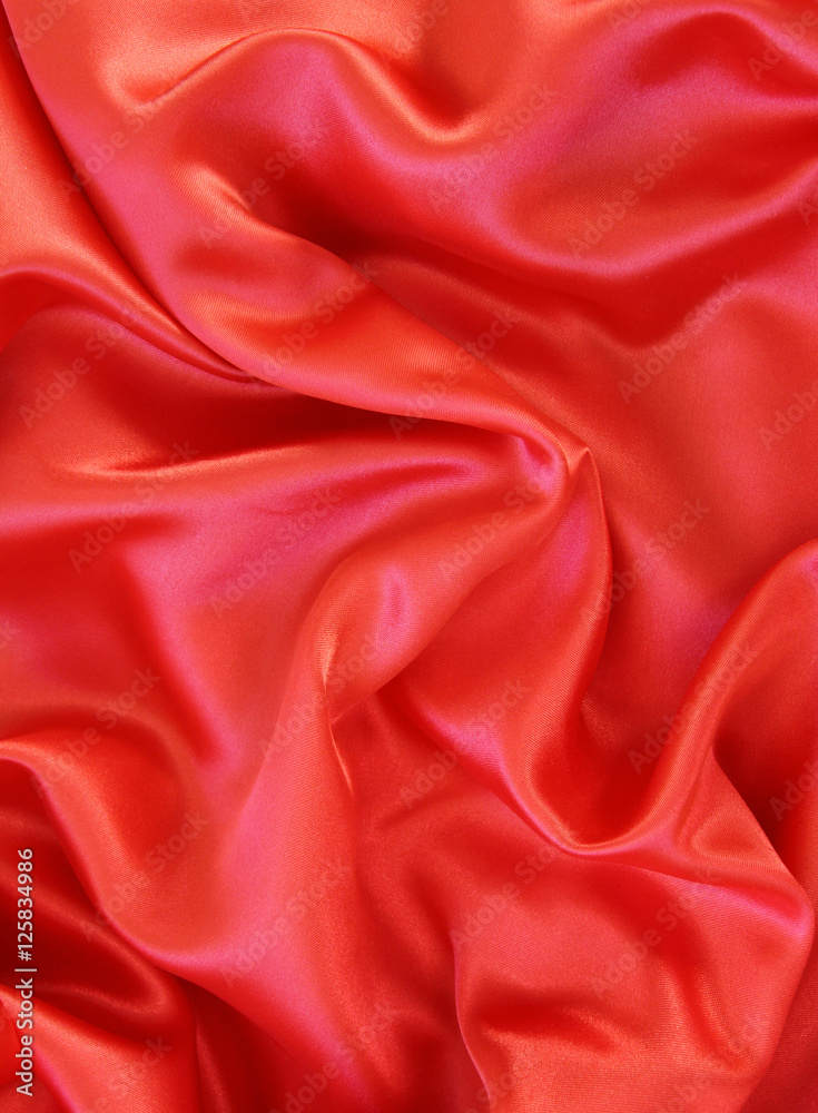 Obraz premium Smooth red silk as background