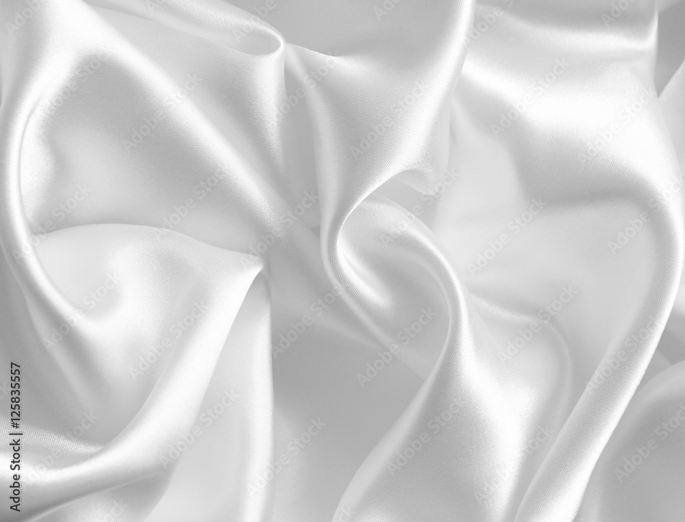 Obraz premium Smooth elegant white silk as wedding background