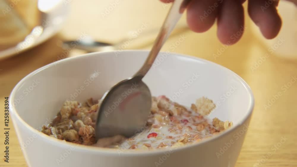 Muesli mixed with a Spoon Muesli mixed with a Spoon