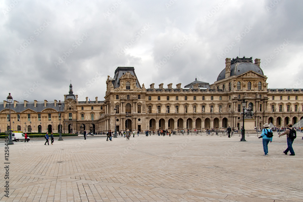 PARIS, FRANCE - april 22, 2016: The Louvre palace in the Carrousel Square. Louvre Museum is one of the largest and most visited museums worldwide