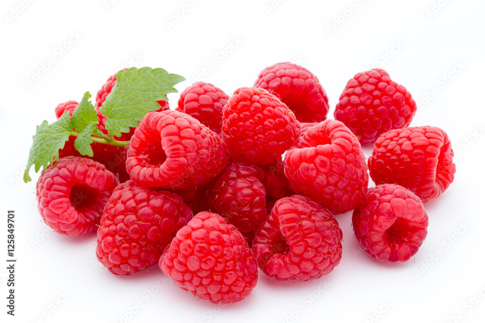 Ripe red raspberries isolated on white background. Ripe red raspberries isolated on white background.