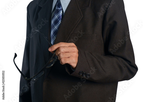 Businessman / View of businessman holding glasses on white background.