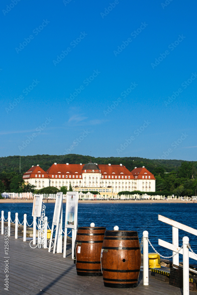 Fototapeta premium The longest wooden mall in Europe. View of the city and the waterfront.
