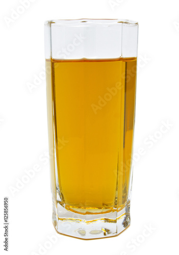 Glass of green apple juice isolated