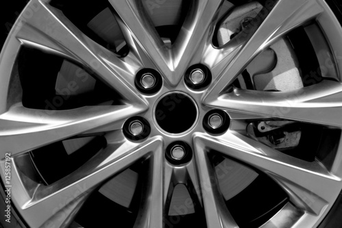 Modern car wheel, closeup photo