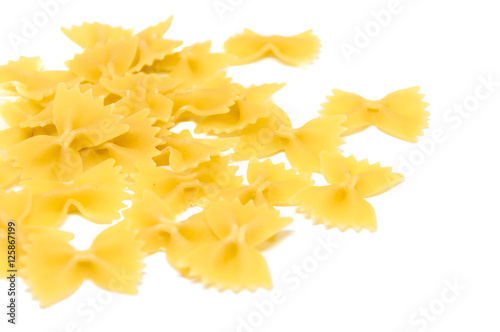 a small portion of farfalla type pasta isolated on white