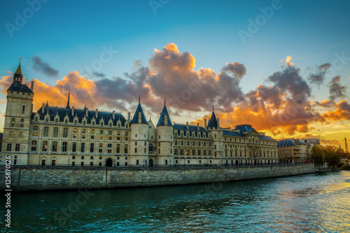 view of the Conciergerie in Paris at sunset