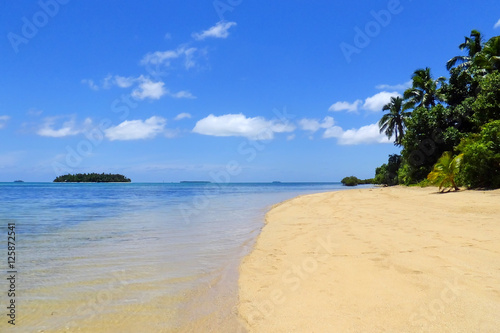 Sandy beach at Pangaimotu island near Tongatapu island in Tonga photo