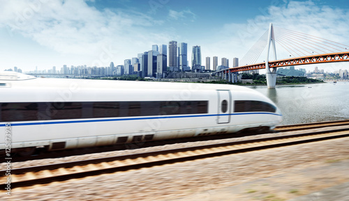 High-speed train through the modern city