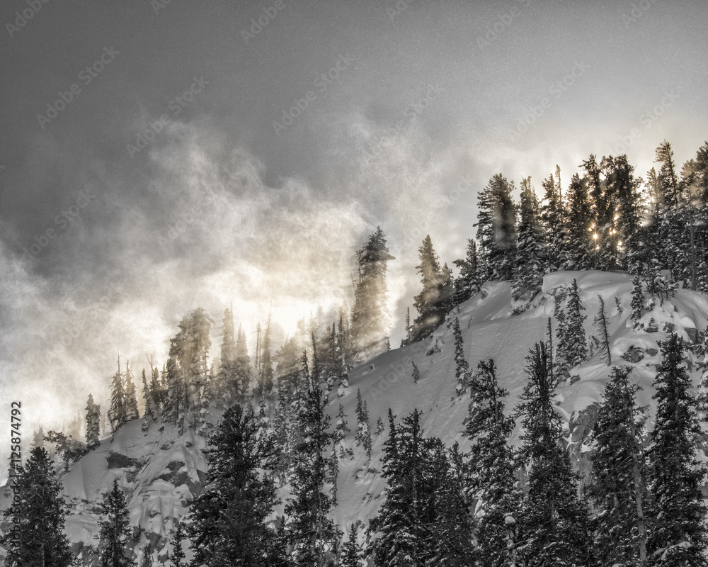 Blowing Snow lighting up on a Teton ridge.