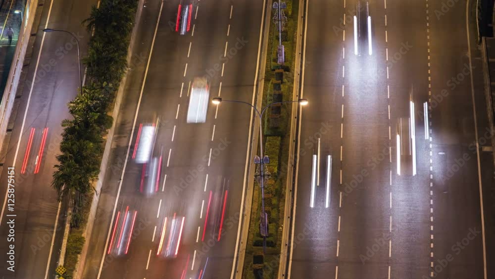 4K Time-lapse of flowing cars on the freeway at night in Kuala Lumpur, Malaysia 4K Time-lapse of flowing cars on the freeway at night in Kuala Lumpur, Malaysia